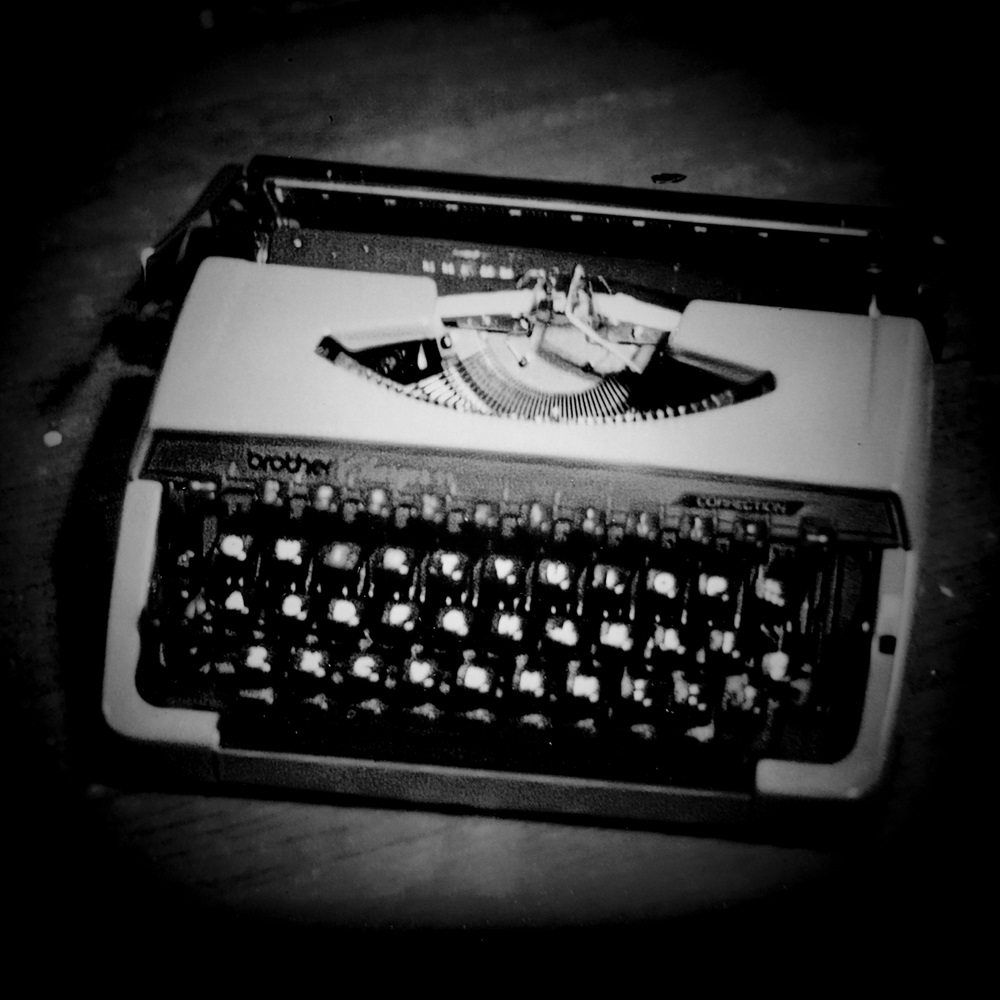 Black and white photo of typewriter.