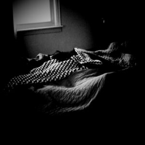 Black and white photo of blankets.