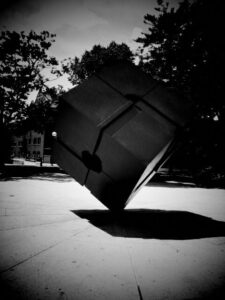 Black and white photo of the cube sculpture