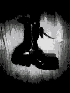 Black and white animated photo of a military boot vibrating with a strange rhythm. Image has been pixelated.