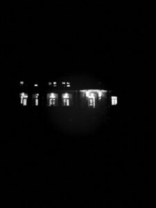 Black and white photo of building at night in Ann Arbor, Michigan, USA.