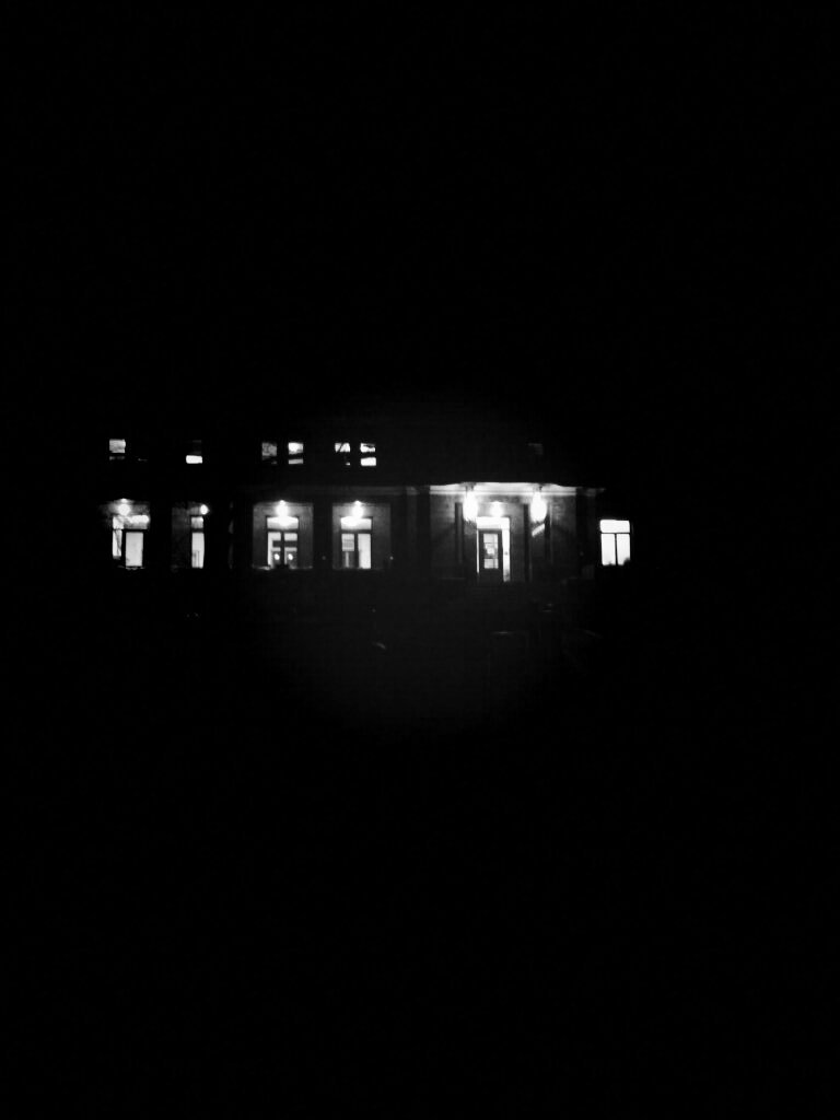 Black and white photo of building at night in Ann Arbor, Michigan, USA.