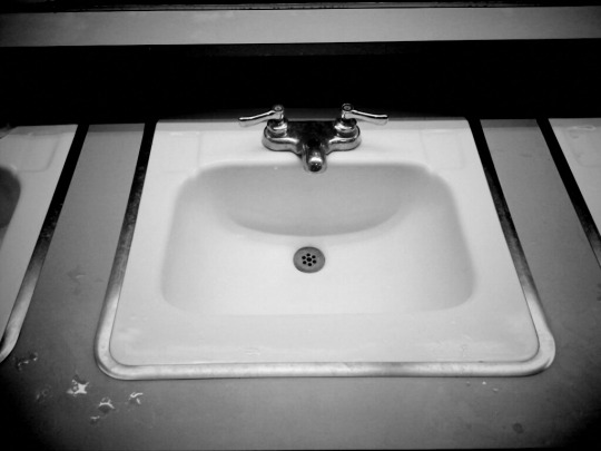 Black and white photo of sink.