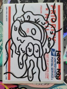 Marker art of fleshy bits with an eye drawn on sticker.