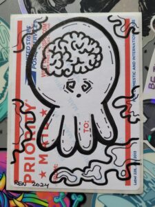 Marker art of octopus with a visible human brain and stressed looking cartoon eyes on sticker.