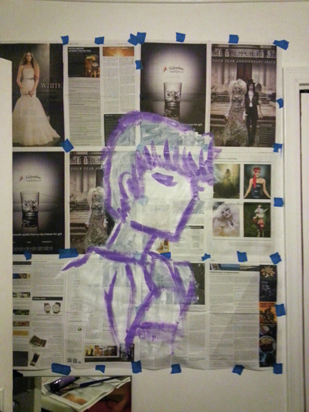 Photo of rough purple outlines added to white painting on newspaper taped to wall.